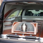 Urn carrier in back of Hearse.jpg