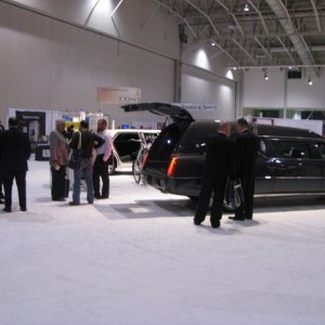Everyone checking out the Hatchback Hearse operated by a remote.