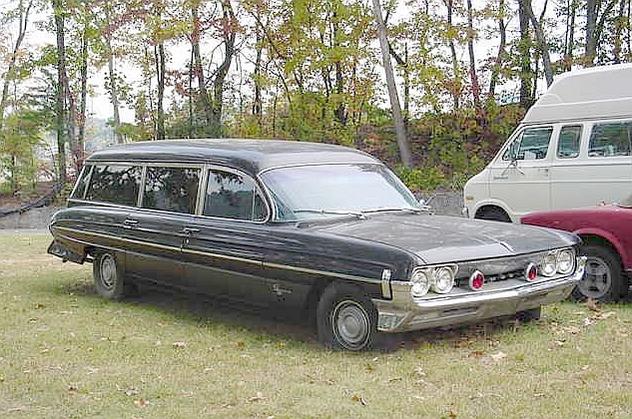 1961 Cotner/Bevington Oldsmobile combination.  Found behind a funeral home in Chattanooga, TN (pictured here) with 12,282.4 original miles.