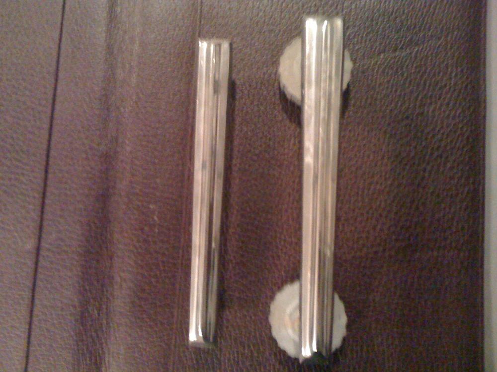 2 pieces removed from roof....there were 2 bolts in the center that held something.  I am looking for the lights.