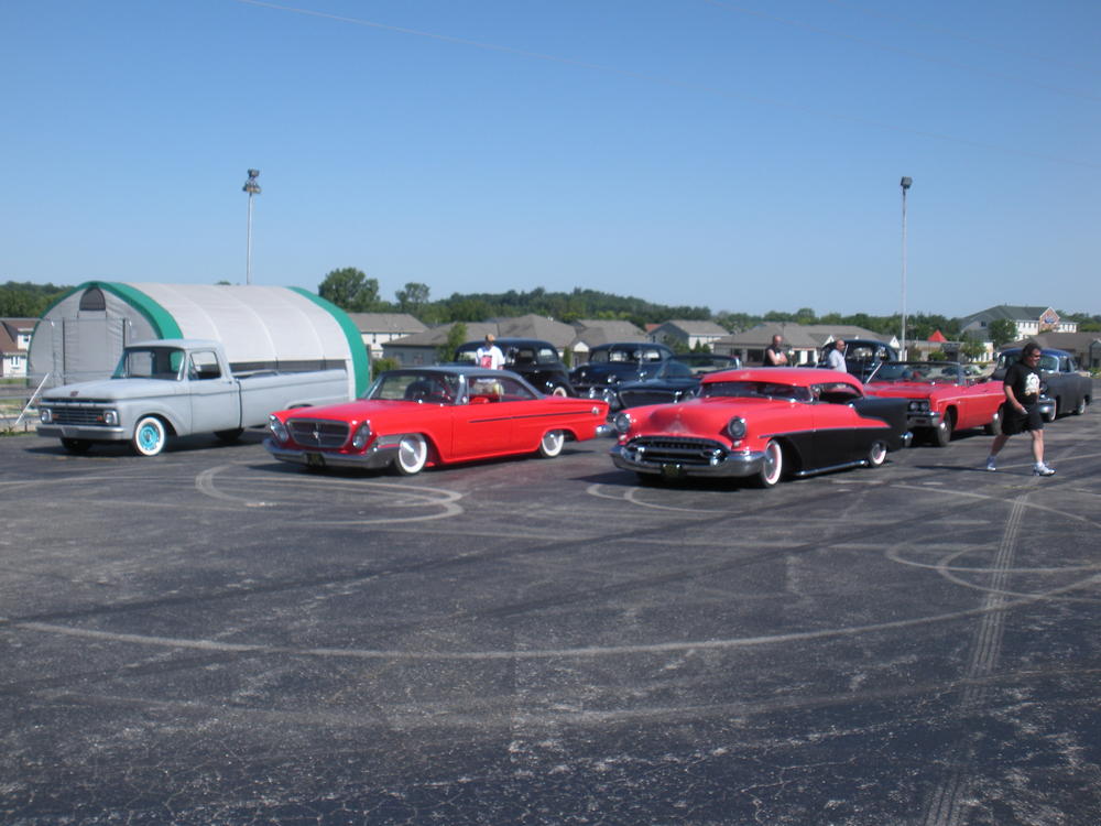 405 picture of my chopped top 1955 olds, and chrysler300 and some of the club cars going to a local show