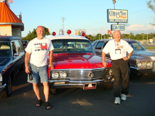 Bill and John getting a lean in. No touching the cars please! Oh, that's Bill's car so it is ok.