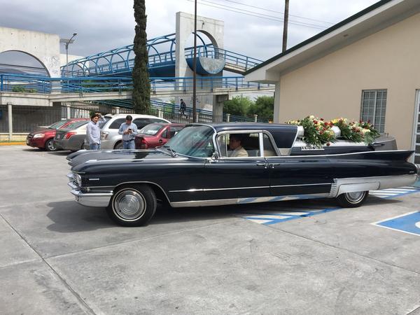 Cadillac 1960 floral  in service