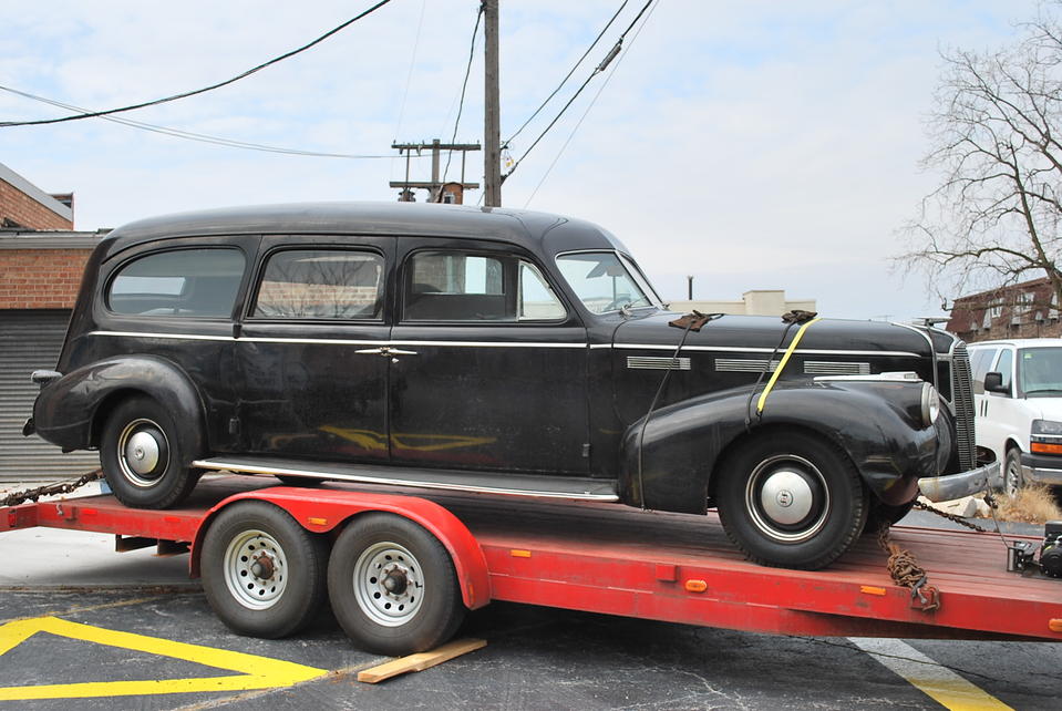 IT IS TRULY A HUGE VEHICLE AND IT IS IN REALLY GOOD SHAPE. THE YELLOW HOOD STRAP WAS TO PROTECT THE HOOD IN TRANSIT AS IT WAS NOT ATTACHED TO THE COWL