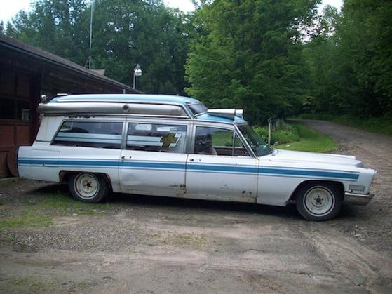 Passenger side view. All of the lower chrome trim was removed and the holes filled during a late '70s repaint (to the blue and white.) Photo taken sum